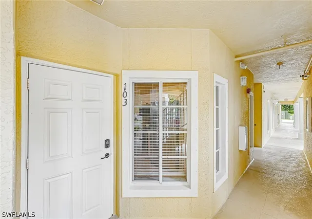 Listing Photo 4 - Condo for sale in building located at 9185 Celeste Dr, Naples, FL 34113 - Unit #1-103