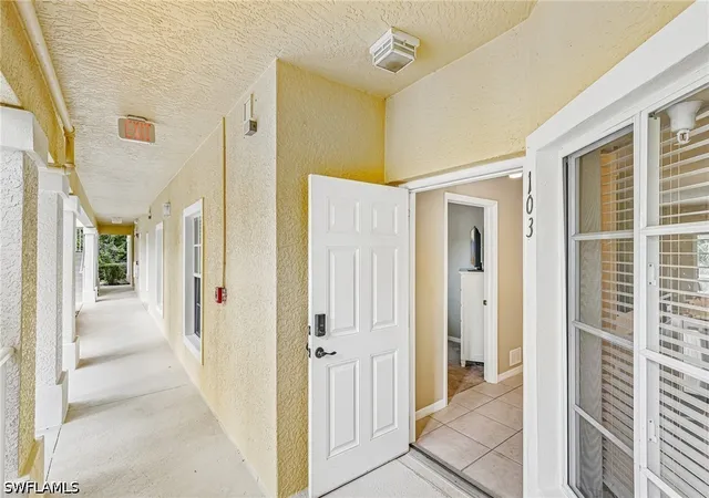 Listing Photo 5 - Condo for sale in building located at 9185 Celeste Dr, Naples, FL 34113 - Unit #1-103