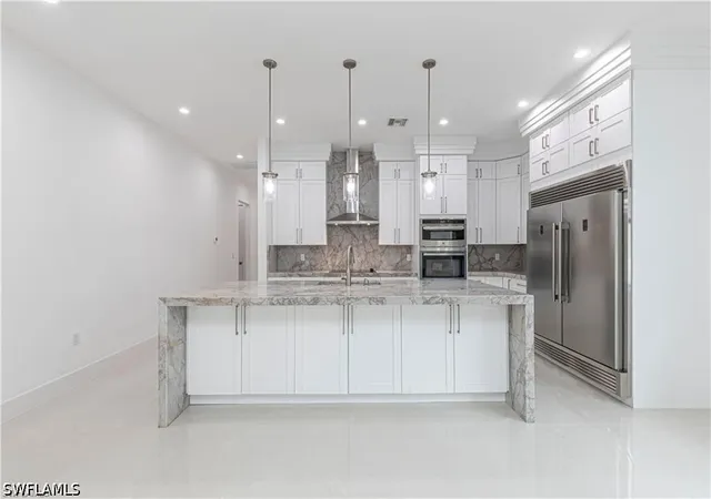 Photo 2 of Single family home for sale at 3098 Pine Tree Dr, Naples, FL 34112 | MLS# 226020037 | Listing updated on 2026-09-15