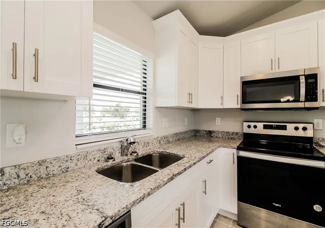 Photo 4 of Single family home for sale at 2702 31st Street SW, Lehigh Acres, FL 33976 | MLS# 2026023147 | Listing updated on 2026-09-03