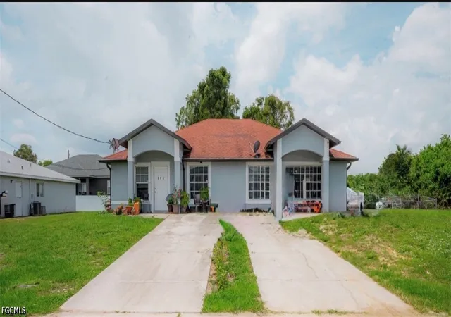Photo 1 of Multi family home for sale at 716 718 Ichabod Ave, Lehigh Acres, FL 33973 | MLS# 2026023210 | Listing updated on 2026-09-20