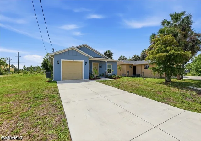 Single family home for sale at 2303 Ben St S, Fort Myers, FL 33916 | MLS# 226020760