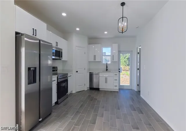 Photo 2 of Single family home for sale at 2173 Mitchell Ct, Fort Myers, FL 33916 | MLS# 226021041 | Listing updated on 2026-09-23