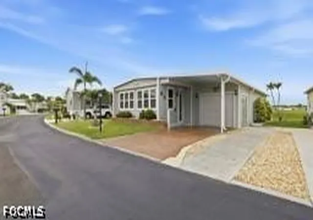 Photo 3 of Manufactured home for sale at 218 Nicklaus Blvd, North Fort Myers, FL 33903 | MLS# 2026024186 | Listing updated on 2026-09-22
