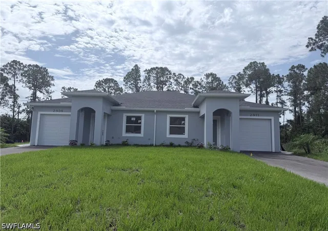 Photo 1 of Multi family home for sale at 2909 Hightower Ave S, Lehigh Acres, FL 33973 | MLS# 226021361 | Listing updated on 2026-09-02