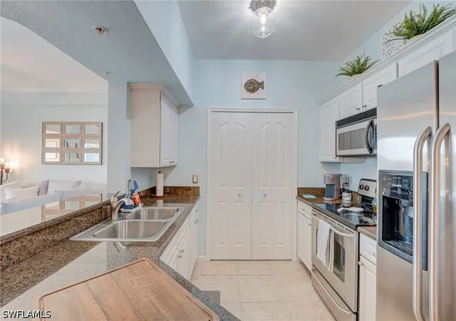 Listing Photo 4 - Condo for sale in building located at 12940 Positano Cir, Naples, FL 34105 - Unit #304