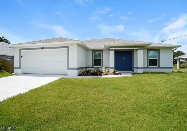 Single family home for sale at 688 Manhattan St E, Lehigh Acres, FL 33974 | MLS# 2026025026