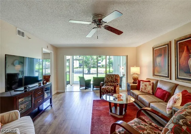 Listing Photo 1 - Condo for sale in building located at 9900 Sunset Cvs Ln, Fort Myers, FL 33919 - Unit #114