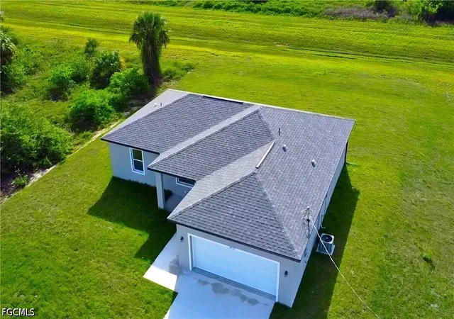 Photo 3 of Single family home for sale at 1239 County St E, Lehigh Acres, FL 33974 | MLS# 2026025222 | Listing updated on 2026-09-16