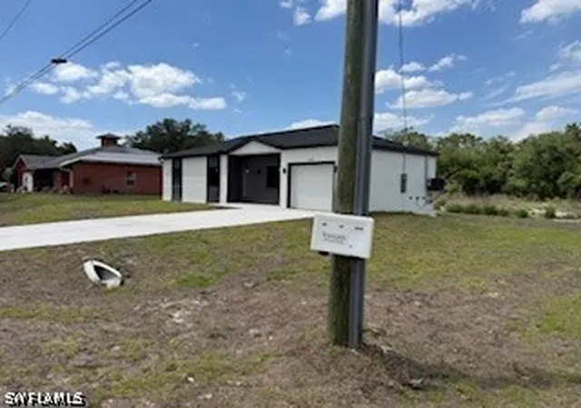 Photo 3 of Single family home for sale at 1907 E 15th Street, Lehigh Acres, FL 33972 | MLS# 226011088 | Listing updated on 2026-09-03