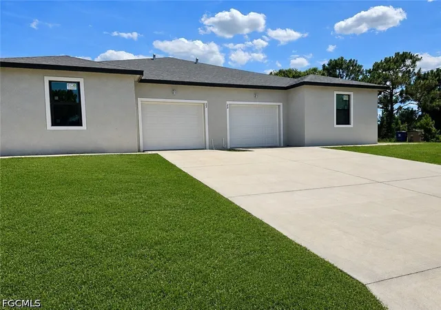 Photo 1 of Multi family home for sale at 23/25 W 12th Street, Lehigh Acres, FL 33972 | MLS# 2026025511 | Listing updated on 2026-09-09