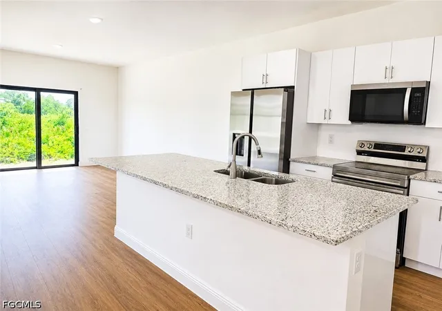 Photo 2 of Multi family home for sale at 23/25 W 12th Street, Lehigh Acres, FL 33972 | MLS# 2026025511 | Listing updated on 2026-09-09