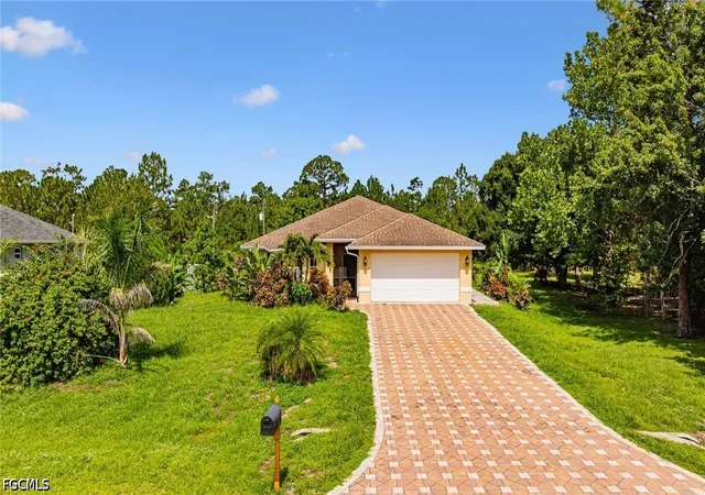 Photo 1 of Sale Pending at 1407 Poinsettia Ave, Lehigh Acres, FL 33972 | MLS# 2026025567 | Listing updated on 2026-09-10