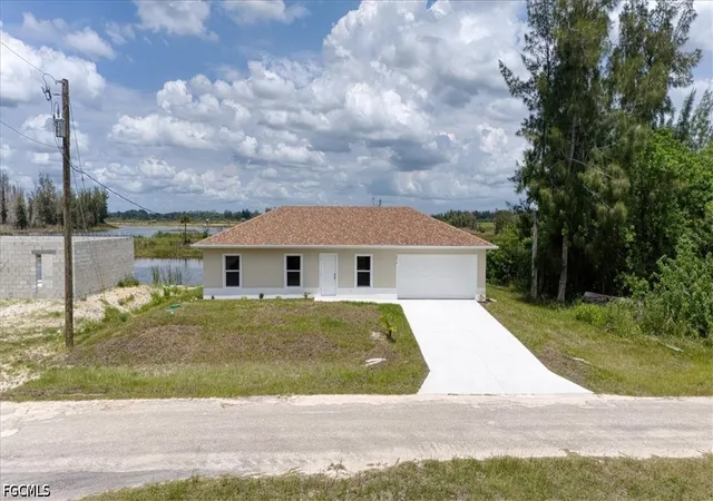 Photo 2 of Single family home for sale at 1816 Long Beach Dr, Lehigh Acres, FL 33972 | MLS# 2026025615 | Listing updated on 2026-09-29