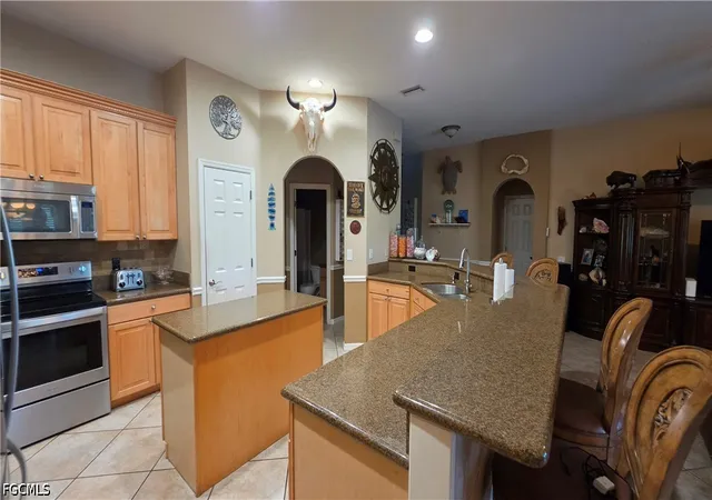 Photo 2 of Single family home for sale at 12810 Aston Oaks Dr, Fort Myers, FL 33912 | MLS# 2026026061 | Listing updated on 2026-09-12