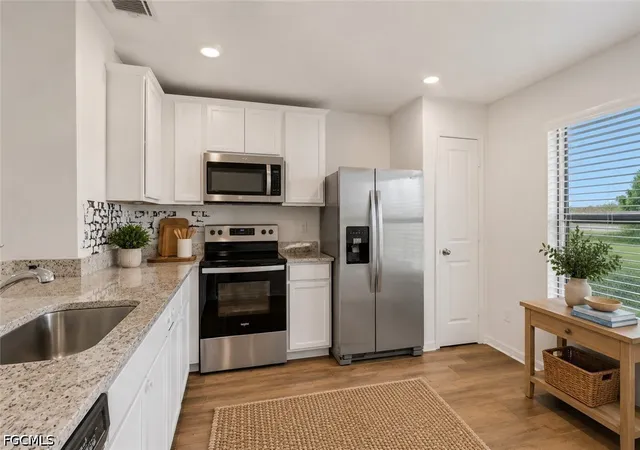 Photo 3 of Single family home for sale at 219 Nw 25th Terrace, Cape Coral, FL 33993 | MLS# 2026026660 | Listing updated on 2026-09-11