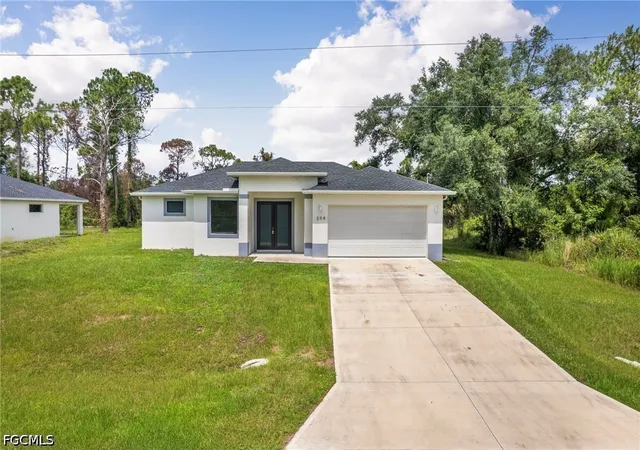 Photo 1 of Single family home for sale at 208 Genoa Ave S, Lehigh Acres, FL 33974 | MLS# 2026027077 | Listing updated on 2026-09-11