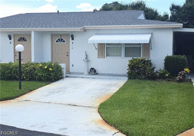 Photo 1 of Townhouse for sale at 1 Dutch Iris Ln, Lehigh Acres, FL 33936 | MLS# 2026027299 | Listing updated on 2026-10-16