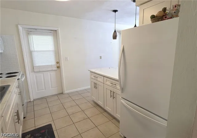 Photo 3 of Townhouse for sale at 1 Dutch Iris Ln, Lehigh Acres, FL 33936 | MLS# 2026027299 | Listing updated on 2026-09-15
