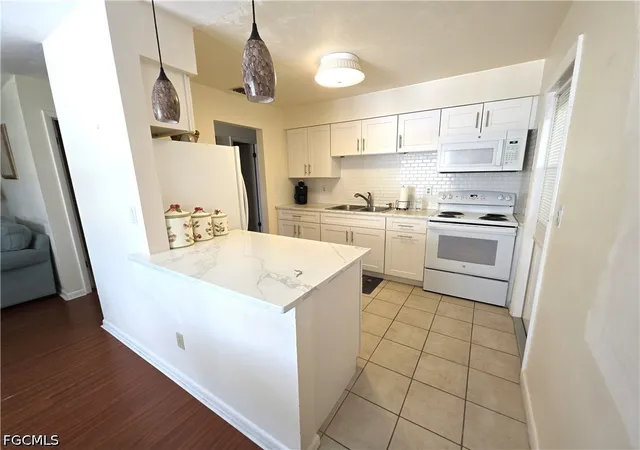 Photo 4 of Townhouse for sale at 1 Dutch Iris Ln, Lehigh Acres, FL 33936 | MLS# 2026027299 | Listing updated on 2026-09-15