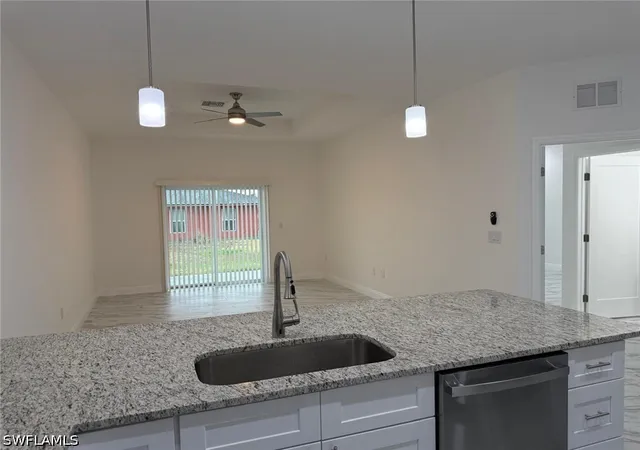Listing Photo 4 - Condo for sale in building located at 5249-5251 Centennial Blvd, Lehigh Acres, FL 33971