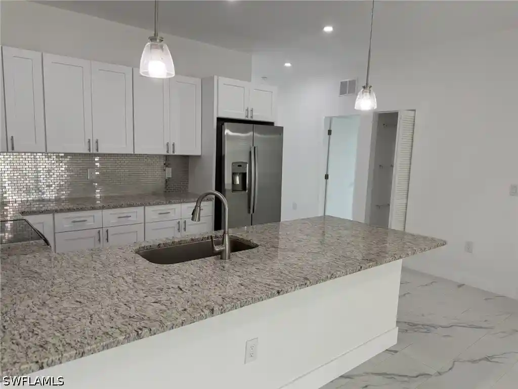 Listing Photo 1 - Condo for sale in 5253-5255 Centennial Blvd located at 5253-5255 Centennial Blvd, Lehigh Acres, FL 33971 - Unit 5253-5255 Centennial Blvd