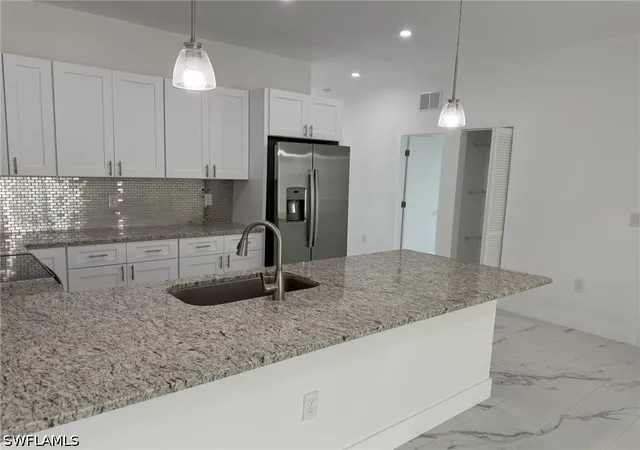 Photo 1 of Multi family home for sale at 5253 5255 Centennial Blvd, Lehigh Acres, FL 33971 | MLS# 226023962 | Listing updated on 2026-09-01