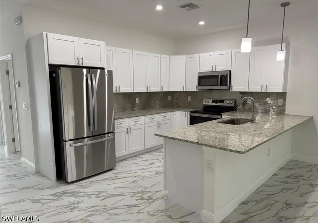 Photo 3 of House for sale at 5253-5255 Centennial Blvd, Lehigh Acres, FL 33971 | MLS# 226023962 | Listing updated on 2026-09-01