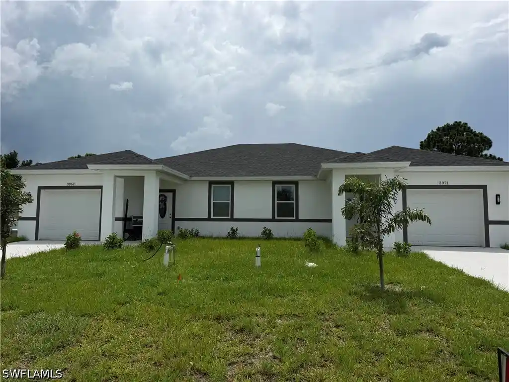Listing Photo 1 - Condo for sale in 3969-3971 Sunset Rd located at 3969-3971 Sunset Rd, Lehigh Acres, FL 33971 - Unit 3969-3971 Sunset Rd