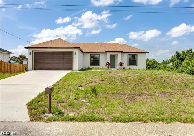 Single family home for sale at 1242 Echard St E, Lehigh Acres, FL 33974 | MLS# 2026027663