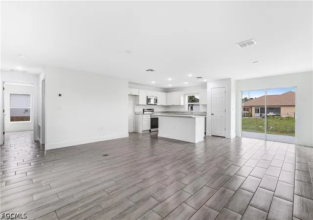 Photo 2 of Single family home for sale at 1242 Echard St E, Lehigh Acres, FL 33974 | MLS# 2026027663 | Listing updated on 2026-10-29
