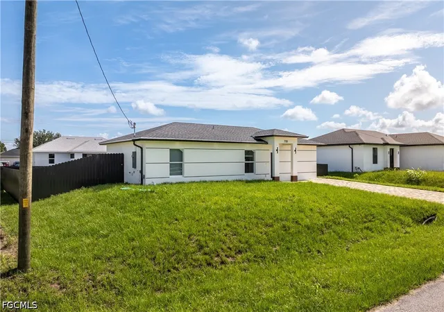 Photo 1 of Single family home for sale at 413 Eisenhower Blvd, Lehigh Acres, FL 33974 | MLS# 2026027478 | Listing updated on 2026-09-02