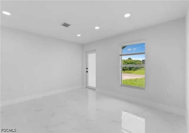 Photo 3 of Single family home for sale at 413 Eisenhower Blvd, Lehigh Acres, FL 33974 | MLS# 2026027478 | Listing updated on 2026-09-02