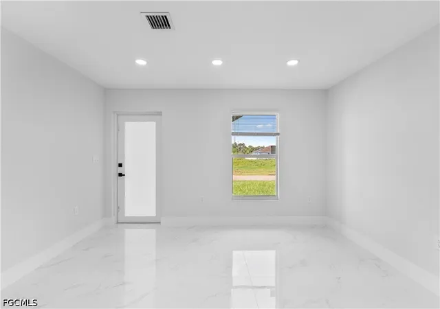Photo 3 of Single family home for sale at 413 Eisenhower Blvd, Lehigh Acres, FL 33974 | MLS# 2026027478 | Listing updated on 2026-09-02