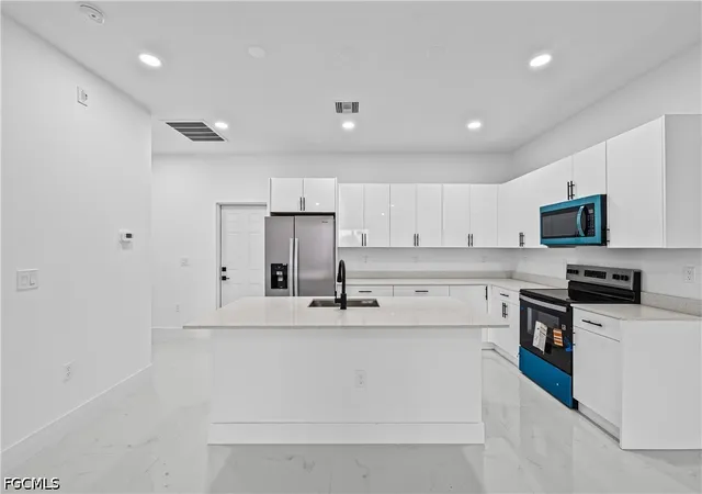 Listing Photo 5 - Condo for sale in building located at 696-698 Creuset Ave S, Lehigh Acres, FL 33974