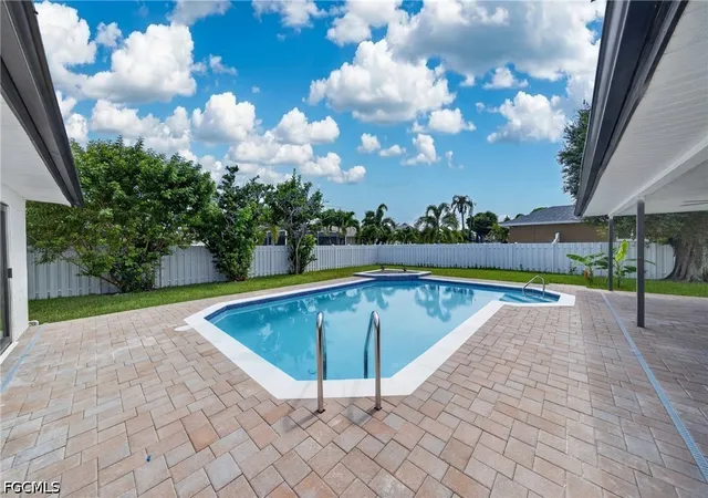 Photo 2 of Single family home for sale at 1408 Sw 49th Street, Cape Coral, FL 33914 | MLS# 2026027880 | Listing updated on 2026-09-08