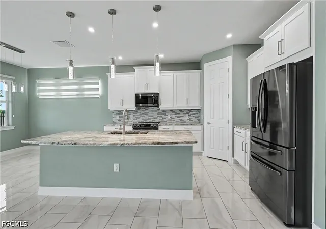 Photo 2 of Sale Pending at 355 Spring Hl Lake Loop, Cape Coral, FL 33993 | MLS# 2026028069 | Listing updated on 2026-08-31