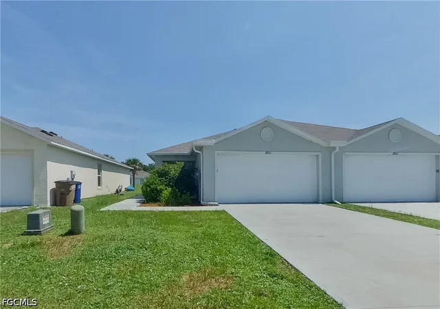 Photo 1 of Townhouse for sale at 18310 Gibraltar Ln, Lehigh Acres, FL 33936 | MLS# 2026028261 | Listing updated on 2026-09-12