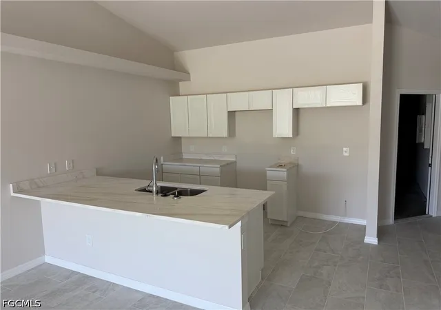 Photo 2 of House for sale at 703 SE 8th Street, Cape Coral, FL 33990 | MLS# 2026028326 | Listing updated on 2026-09-08