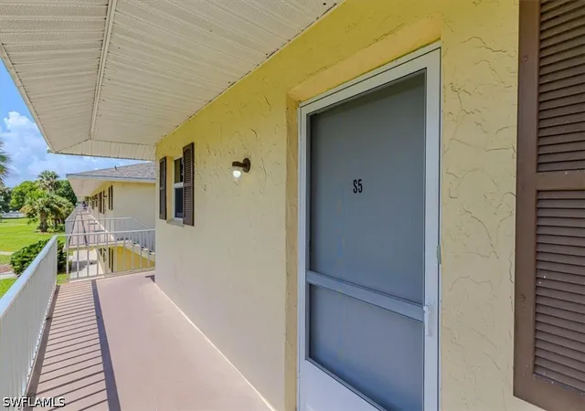 Listing Photo 3 - Condo for sale in building located at 3325 Airport Rd N, Naples, FL 34105 - Unit #S5