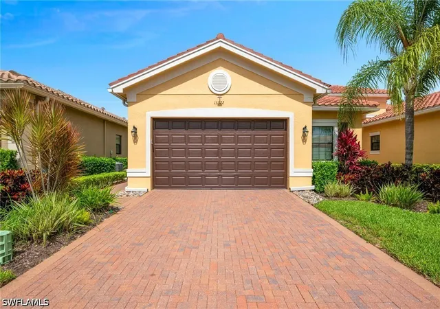 Photo 1 of Townhouse for sale at 13322 Silktail Dr, Naples, FL 34109 | MLS# 226022182 | Listing updated on 2026-09-14