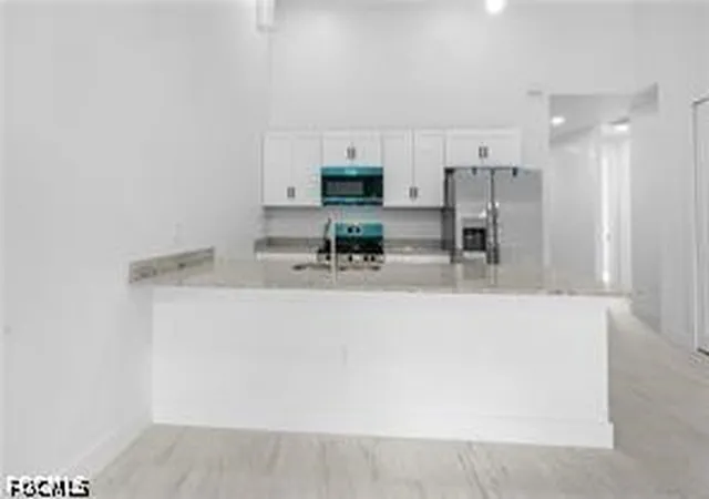 Listing Photo 5 - Condo for sale in building located at 1147 Harvest Ave, Lehigh Acres, FL 33974