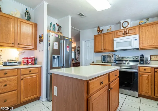 Photo 4 of Manufactured home for sale at 19876 Frenchmans Ct, North Fort Myers, FL 33903 | MLS# 2026029516 | Listing updated on 2026-09-11