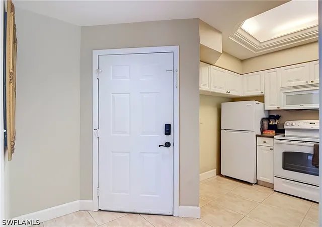 Listing Photo 4 - Condo for sale in building located at 3323 Olympic Dr, Naples, FL 34105 - Unit #716