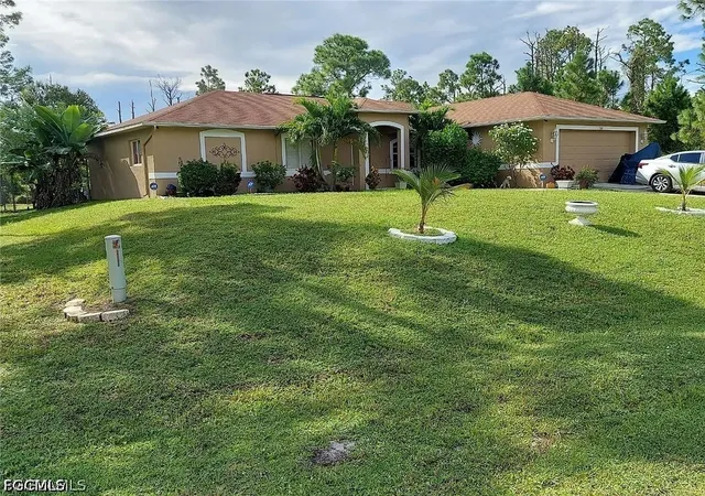 Photo 1 of Single family home for sale at 764 Chapman Ave S, Lehigh Acres, FL 33974 | MLS# 2026029625 | Listing updated on 2026-10-11