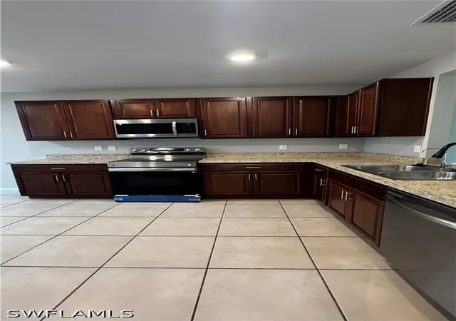Photo 3 of Single family home for sale at 2913 65th Street W, Lehigh Acres, FL 33971 | MLS# 226025408 | Listing updated on 2026-09-14
