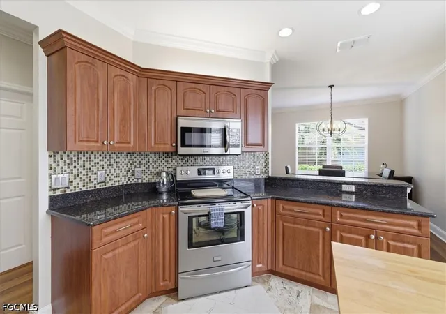 Listing Photo 5 - Condo for sale in building located at 9361 Alamander Ct, Fort Myers, FL 33919 - Unit #401