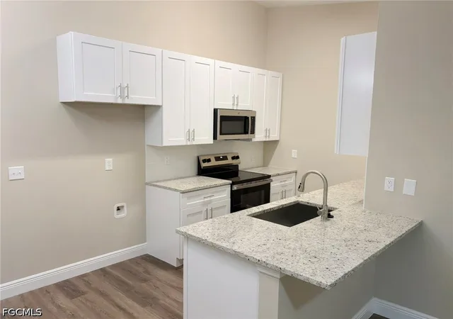Listing Photo 4 - Condo for sale in building located at 1425 SW 51st Ln, Cape Coral, FL 33914 - Unit #95