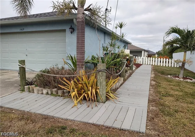 Photo 2 of Single family home for sale at 1409 NW 9th Terrace, Cape Coral, FL 33993 | MLS# 2026030123 | Listing updated on 2026-09-18
