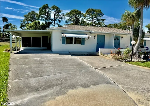 Photo 2 of Townhouse for sale at 4 Desert Ash Ct, Lehigh Acres, FL 33936 | MLS# 2026030273 | Listing updated on 2026-09-02